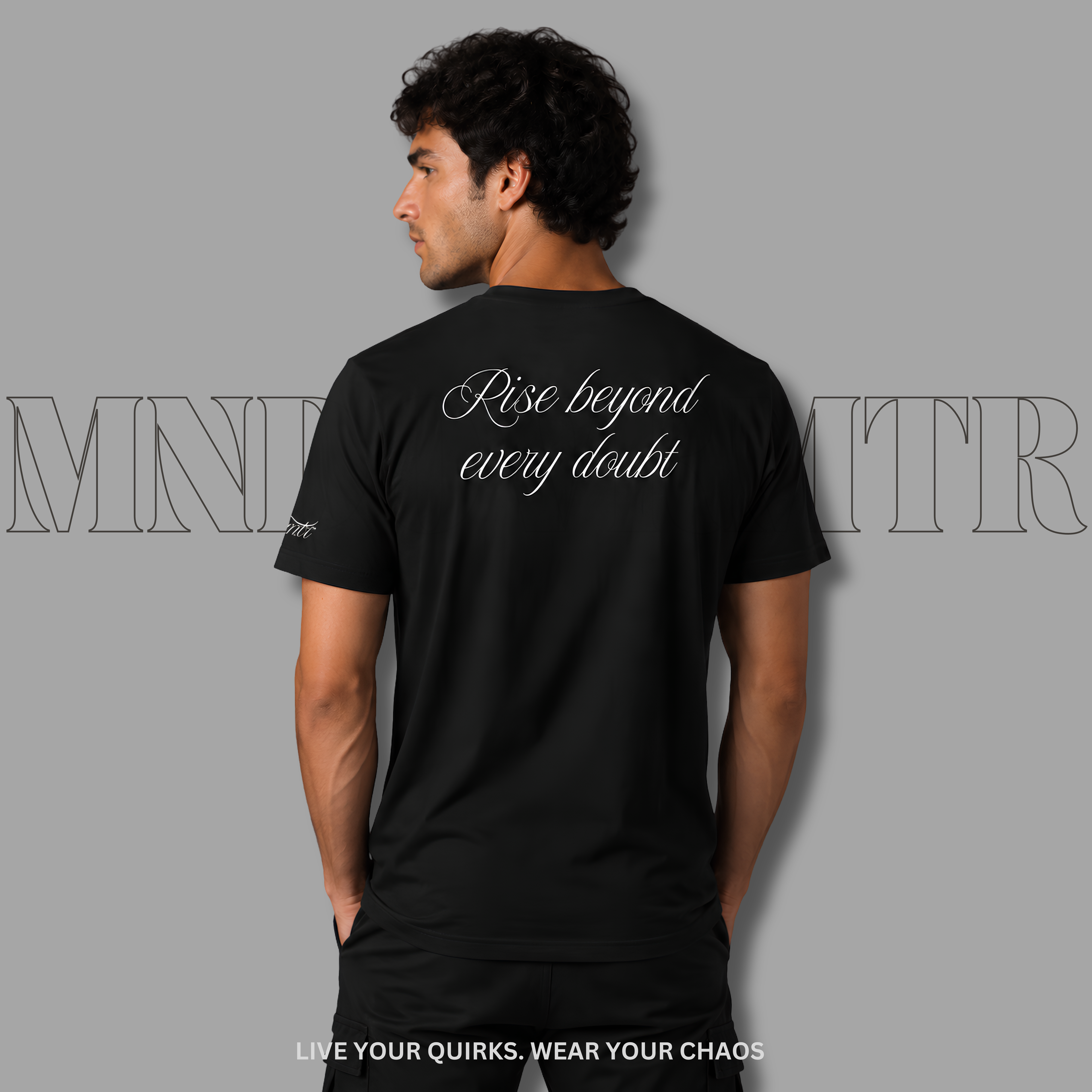 MNDOVRMTR Black Script Shirt – Minimalist Mind Over Matter Streetwear Tee - worn by a stunning male model, standing against a grey background