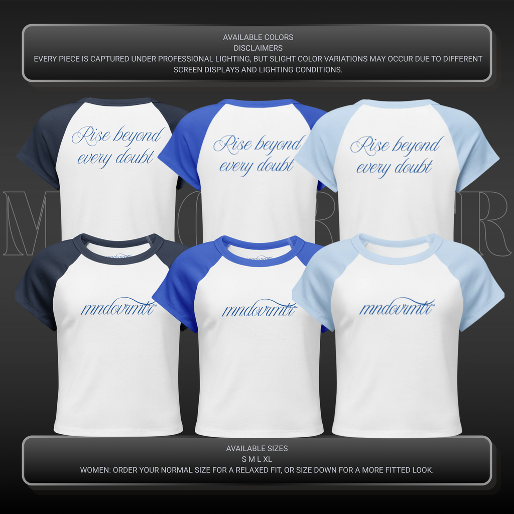 MNDOVRMTR women’s raglan baby tee in navy, royal blue, and light blue with front logo and “Rise beyond every doubt” back design.