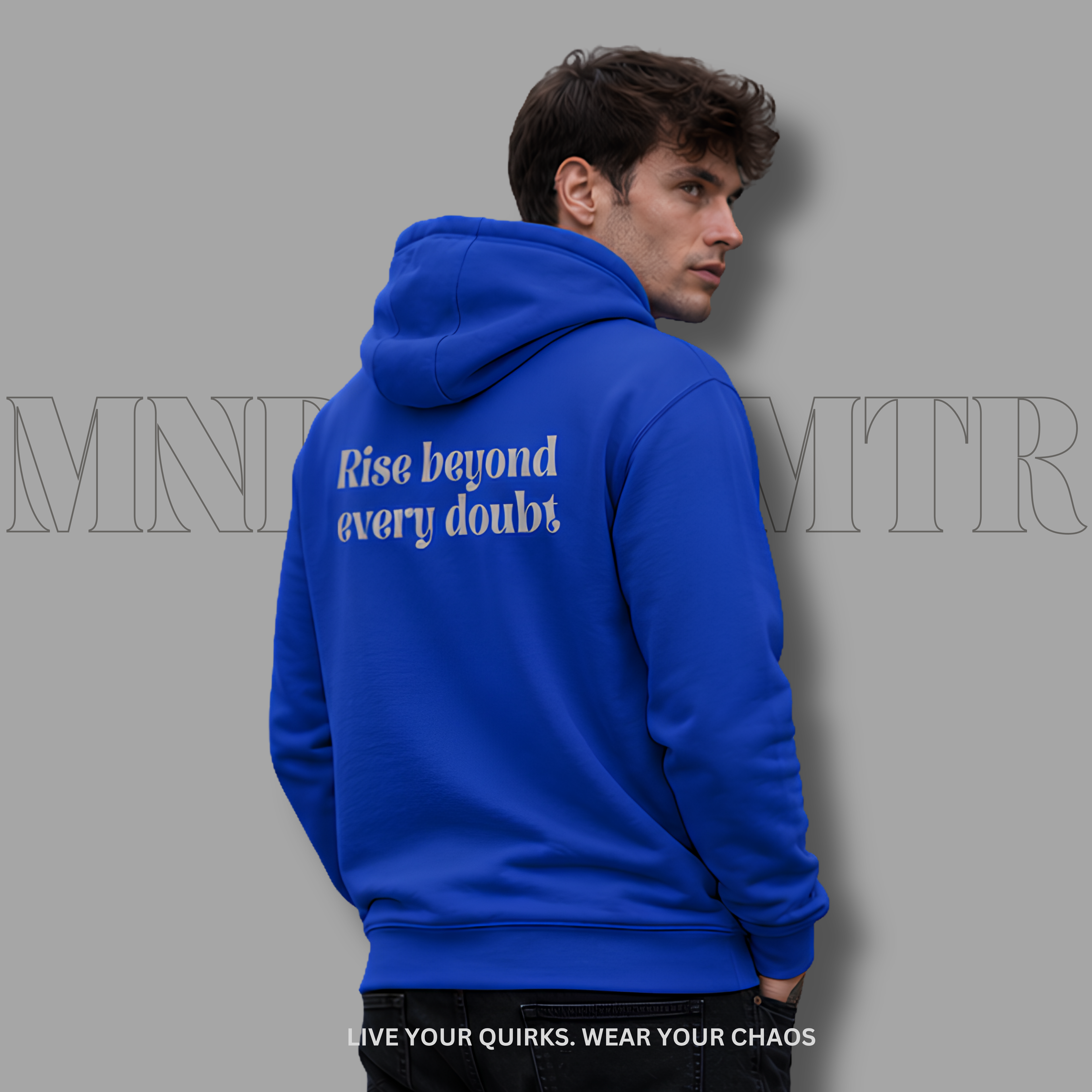 A man wearing a bright blue, fleece hoodie, shown from the back and side. The hoodie features the grey  text 'Rise beyond every doubt' printed on the back.