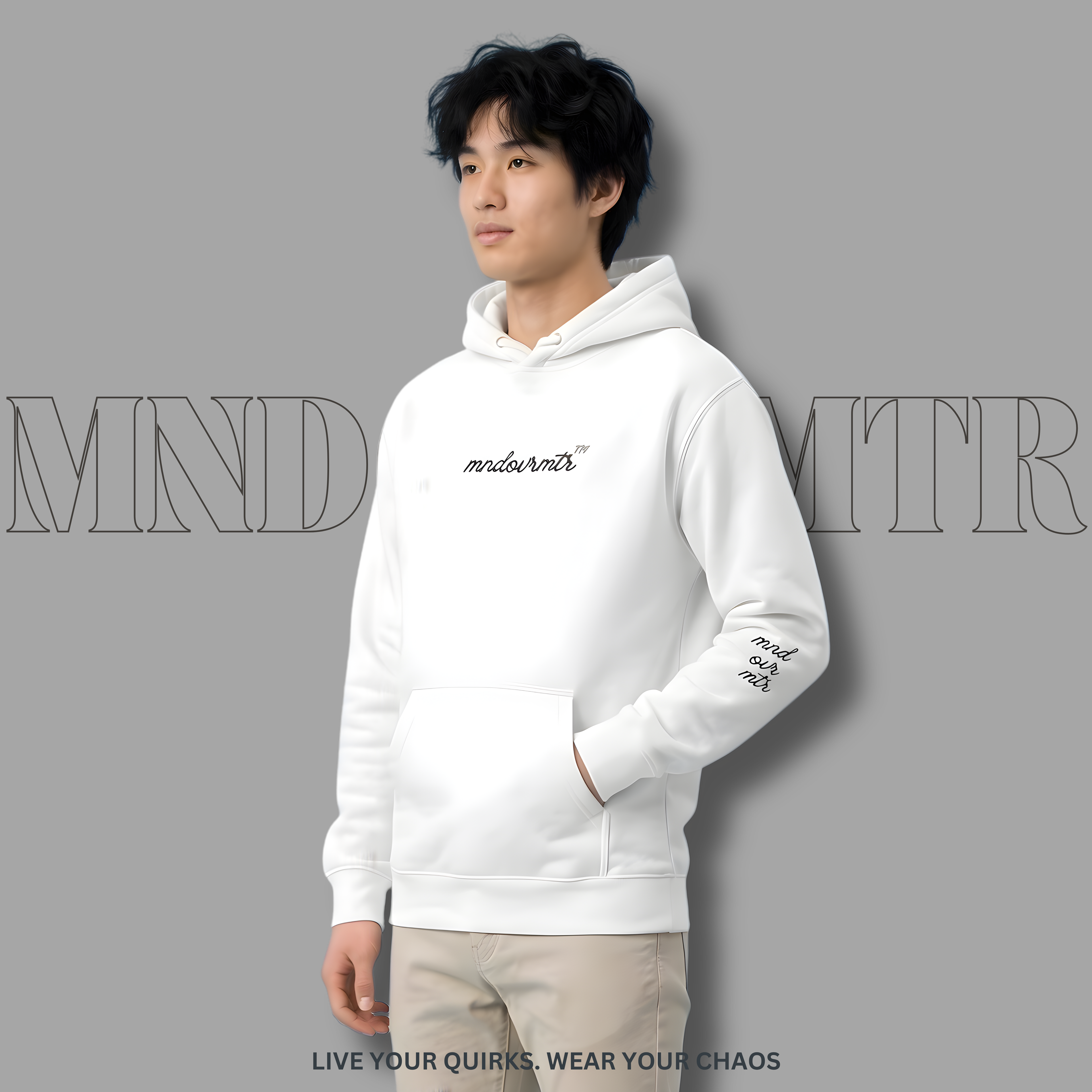MNDOVRMTR oversized fleece hoodie worn by a young adult male model on a gray background