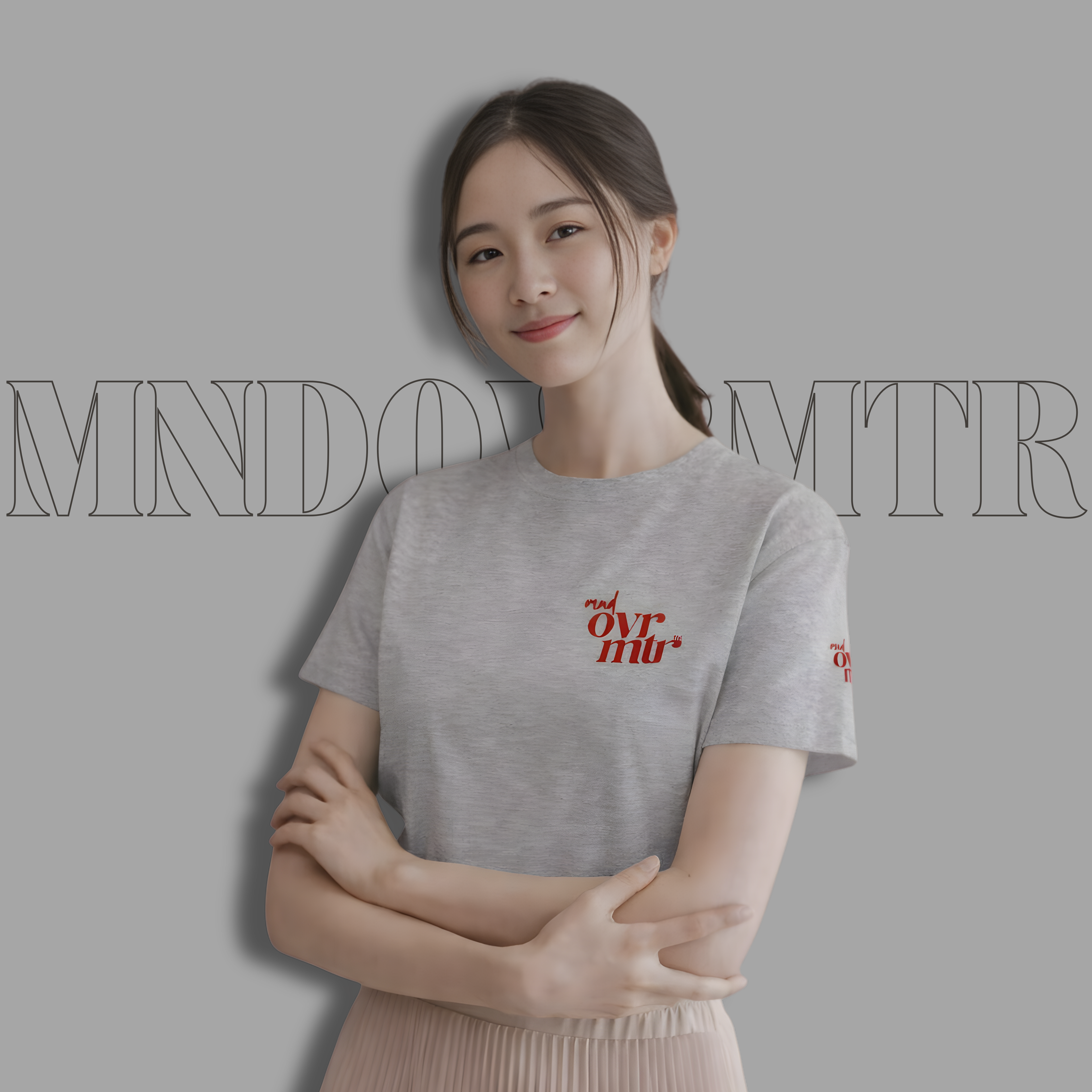 MNDOVRMTR™ stacked logo t-shirt in grey - unisex streetwear tee, front view