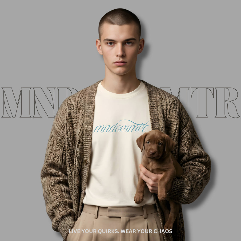 MNDOVRMTR Script Shirt – Minimalist Mind Over Matter Streetwear Tee worn by a man holding a puppy 