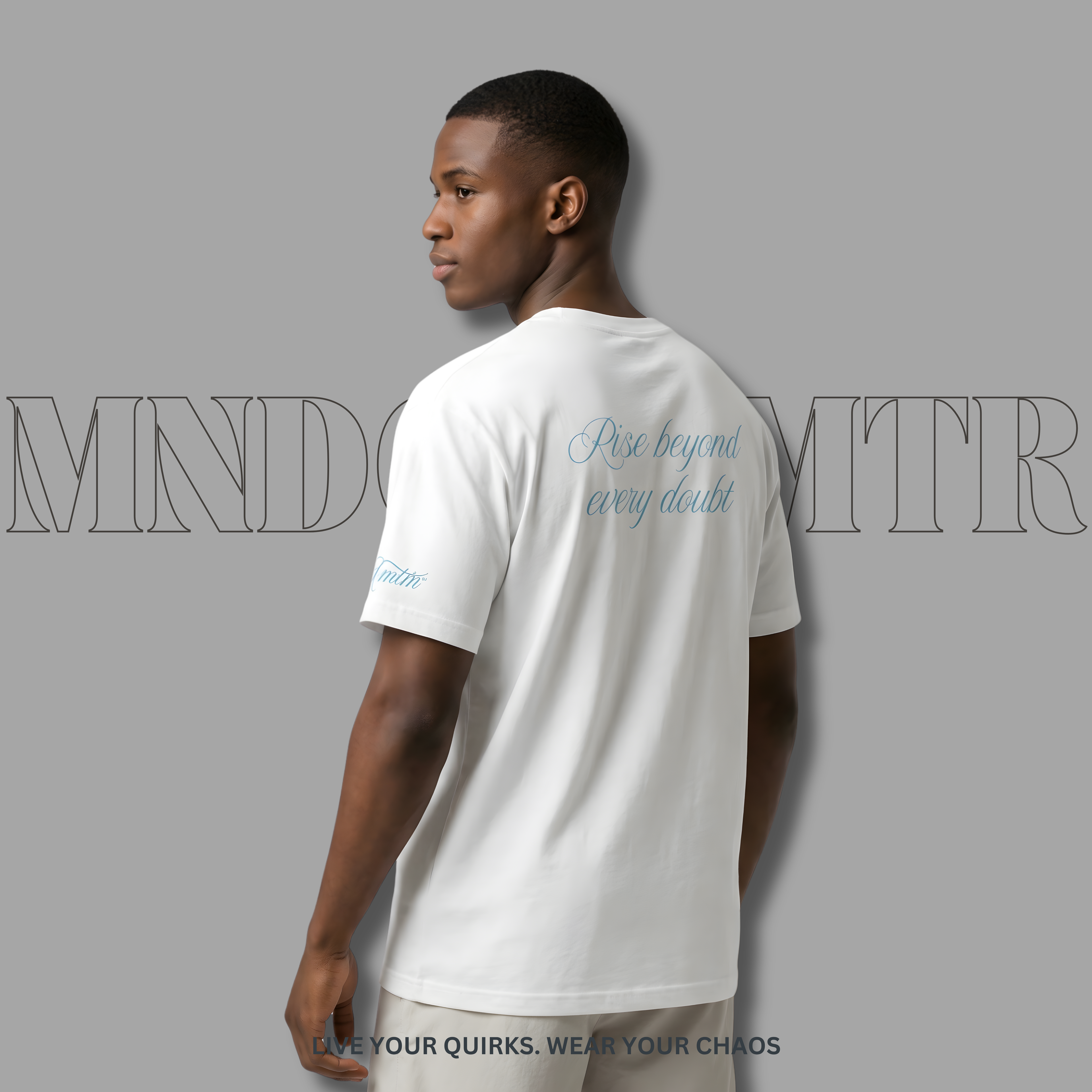 MNDOVRMTR 100% Cotton - Script  White Shirt – Minimalist Mind Over Matter Streetwear Tee - worn by a magnificent male model, highlighting the back design details. Soft cursive script"Rise beyond every doubt".